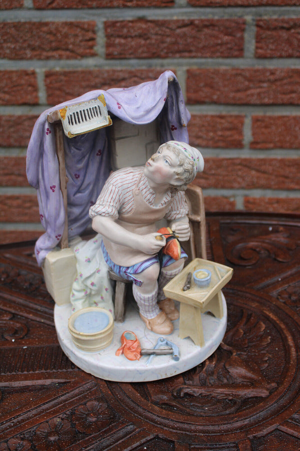 Vintage italian capodimonte porcelain shoe maker statue figurine
