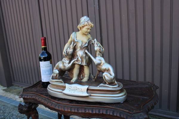Antique art deco ceramic sculpture signed boy with grey hound dogs
