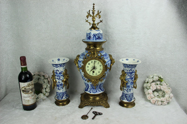 ANTIQUE BOCH Delft blue white pottery bird  pottery Clock Vases lion heads mark