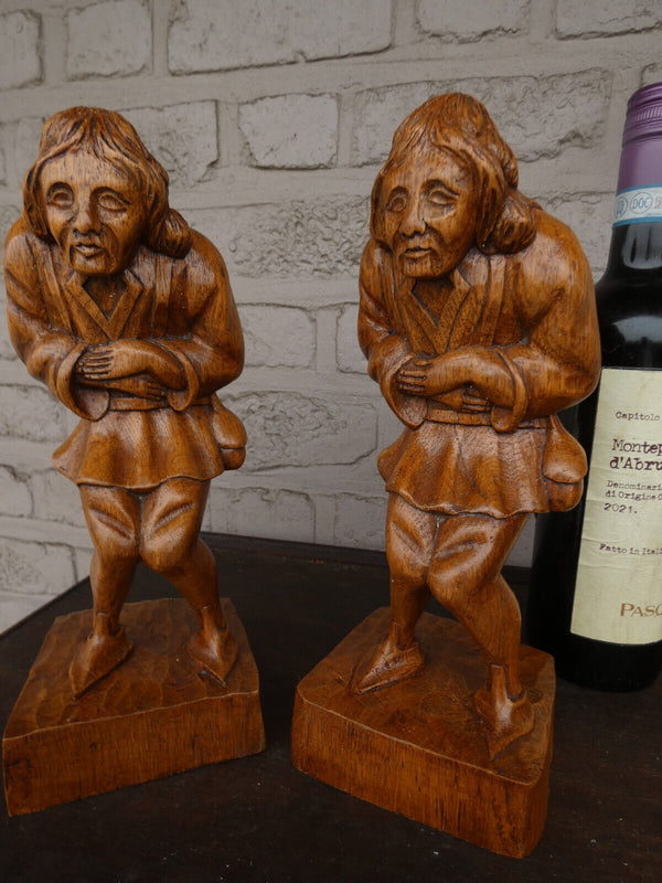 pair antique wood carved hunchback notre dame statues