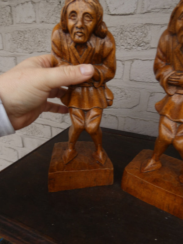 pair antique wood carved hunchback notre dame statues