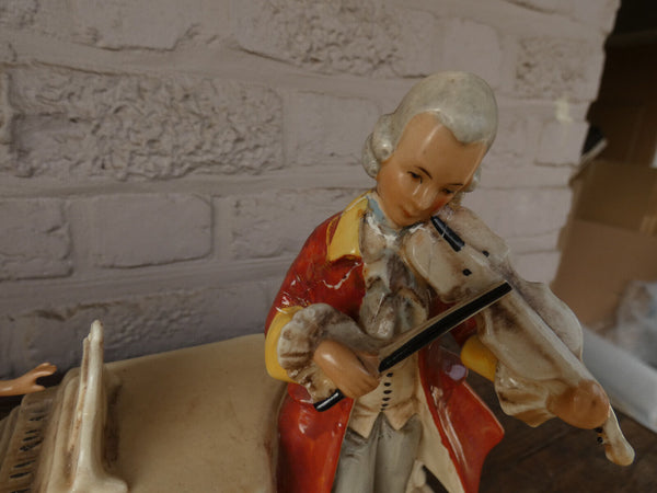 German Grafenthal marked porcelain statue music playing dog
