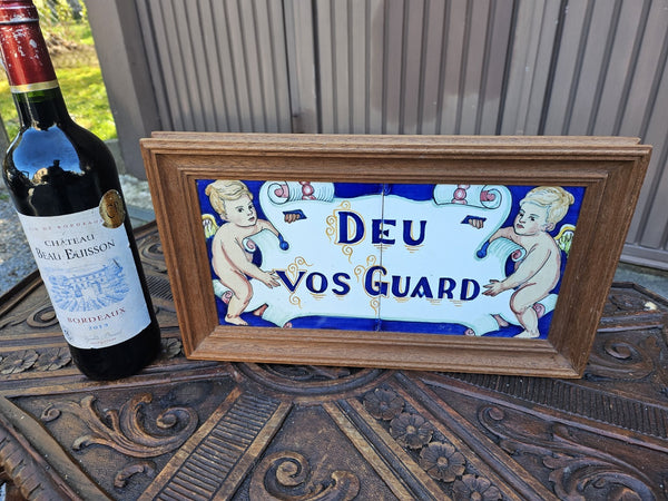 Vintage pottery tile in wood frame spanish text  God be with you angels
