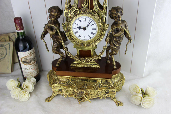 XL heavy French Putti Faun Brass wood Clock Louis XVI 1960's