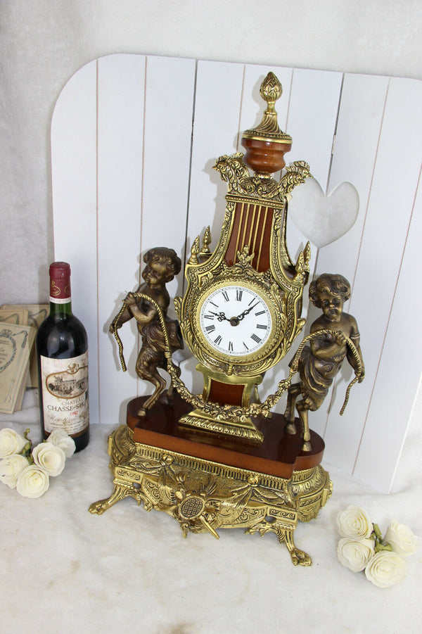 XL heavy French Putti Faun Brass wood Clock Louis XVI 1960's