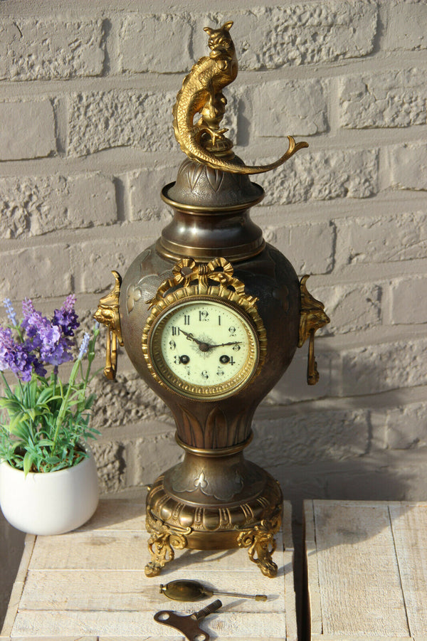 Antique French metal brass lion heads gothic dragon animal clock