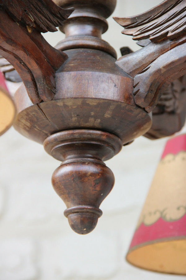 Antique German black forest wood carved griffin bird gothic 4 arm chandelier