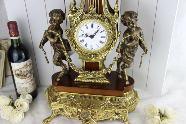 XL heavy French Putti Faun Brass wood Clock Louis XVI 1960's