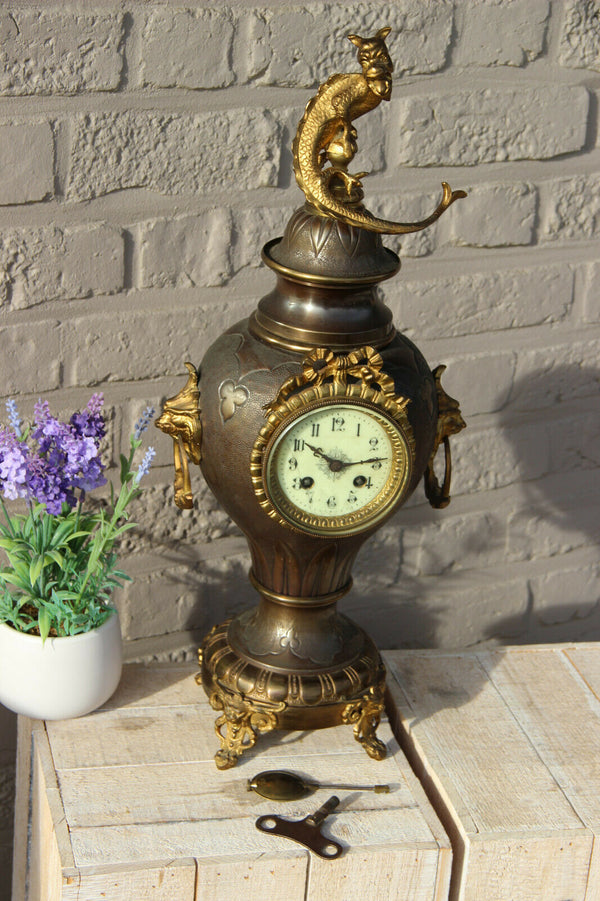 Antique French metal brass lion heads gothic dragon animal clock