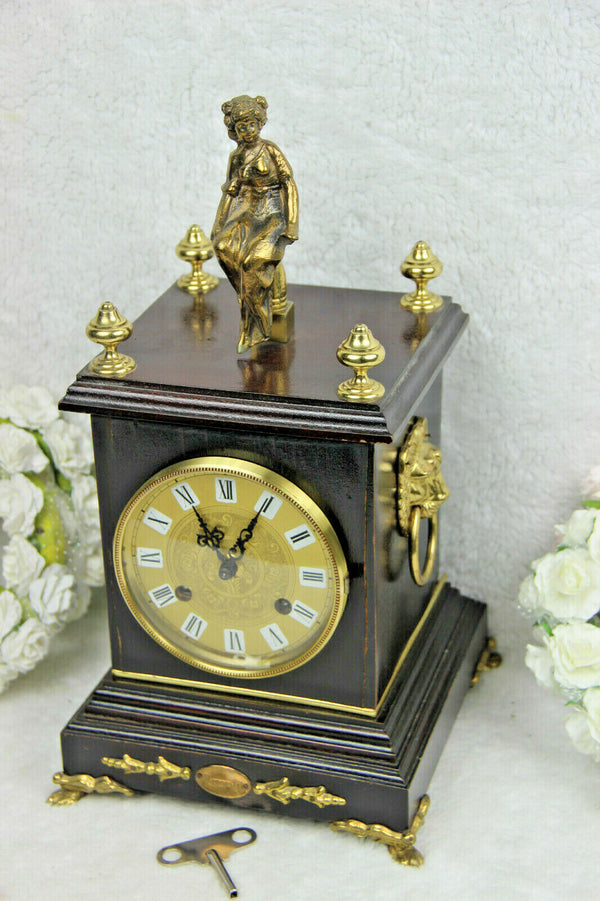 Vintage VANGESTEL Wood carved clock with bronze lady and lion heads 1970s FHS