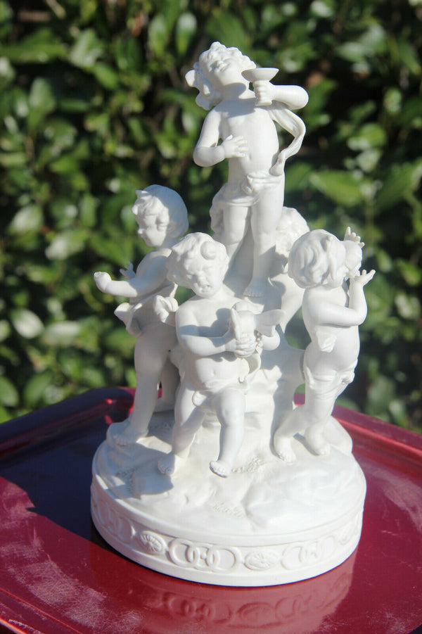 Antique French bisque porcelain putti cherub group