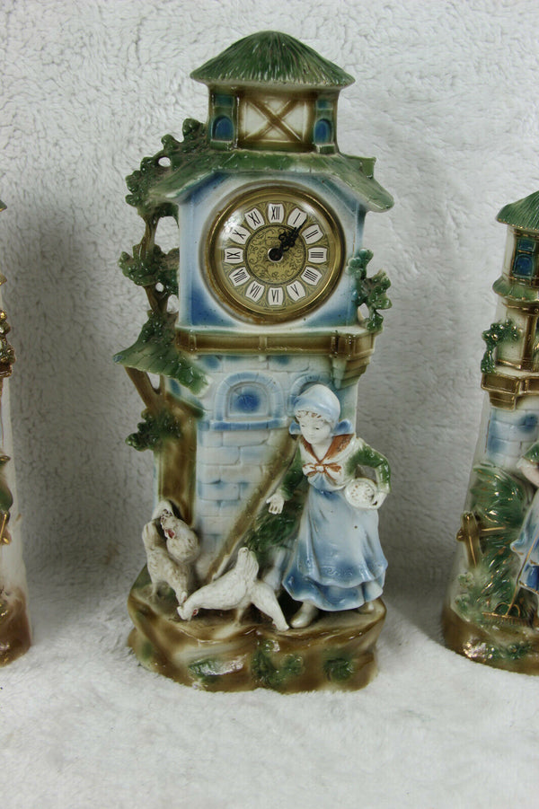 Antique German porcelain bisque marked Clock set romantic figurines set