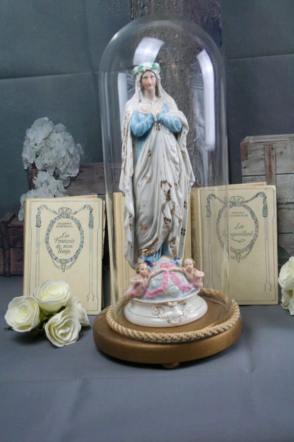 antique porcelain Holy MAry MAdonna statue with cherubs on base  under globe