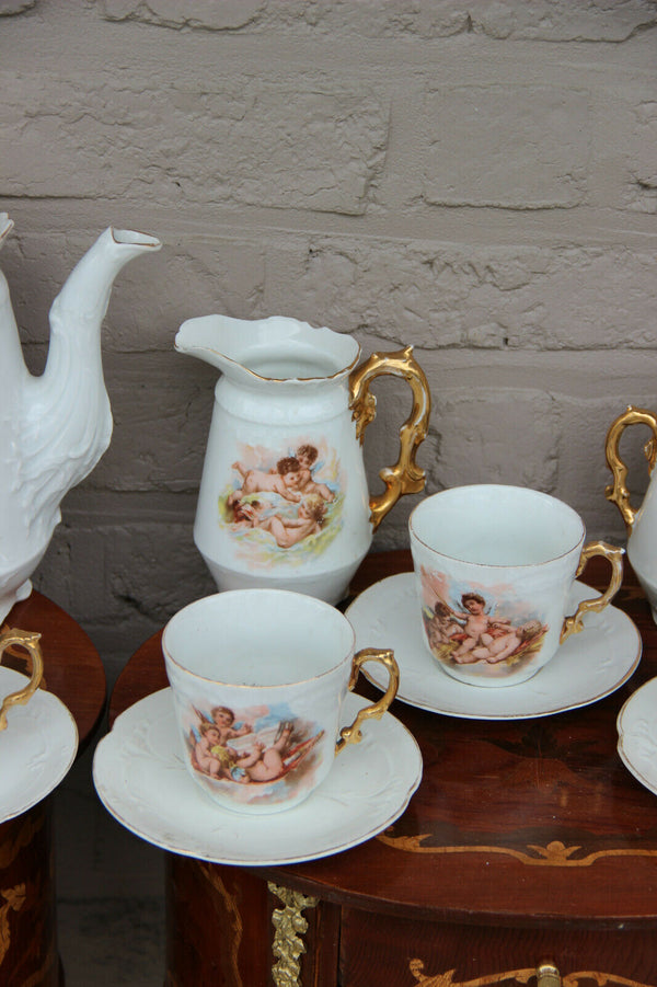 Rare French antique porcelain putti angel coffee milk sugar tea cups set