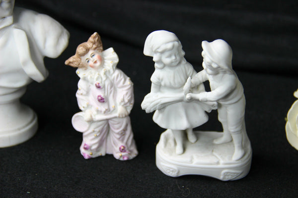 Set of 4 porcelain / bisque statues