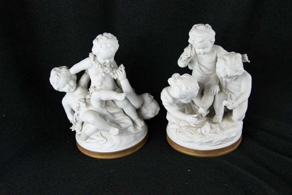 Pair German Unterweissbach marked porcelain bisque putti angels group statues