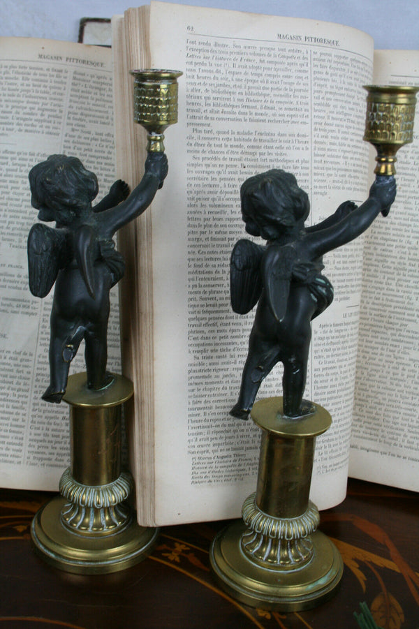 Pair Exclusive 19thc Patinated Bronze and Parcel Gilt Putti-form Candlesticks