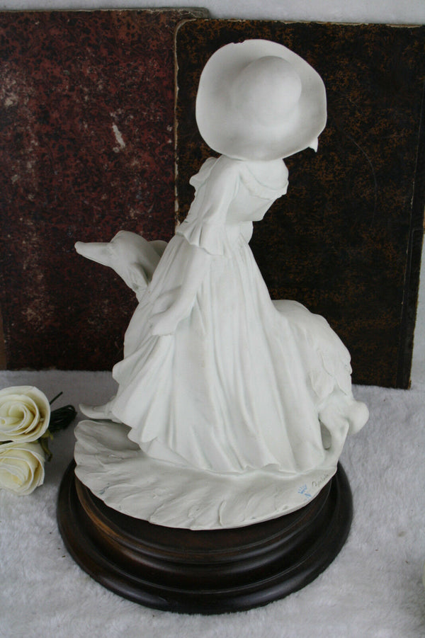 Capodimonte marked Bisque porcelain lady with whippet dog statue marked