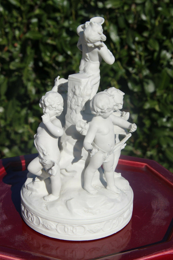 Antique French bisque porcelain putti cherub group