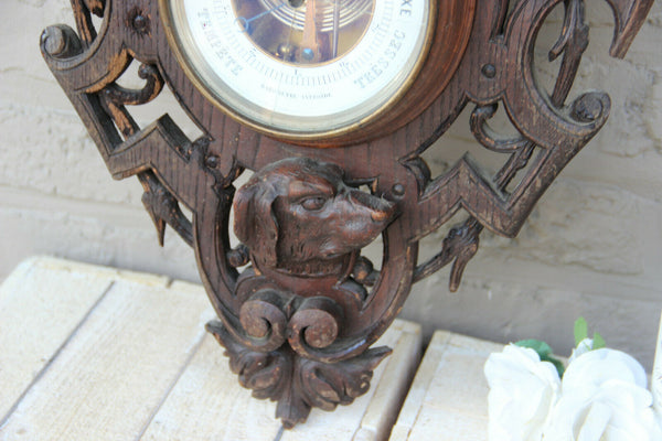 Large black forest wood carved dog barometer
