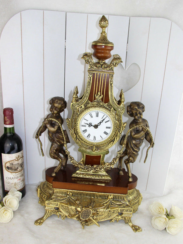 XL heavy French Putti Faun Brass wood Clock Louis XVI 1960's