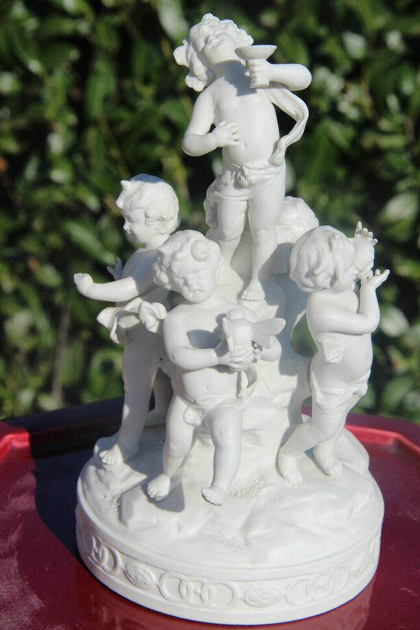 Antique French bisque porcelain putti cherub group