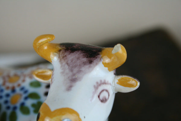 Dutch polychrome Makkum tichelaar marked girl milking cow pottery figurine