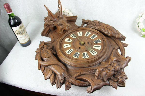 Antique Black Forest wood carved hunting satyr devil head deer fish bird clock