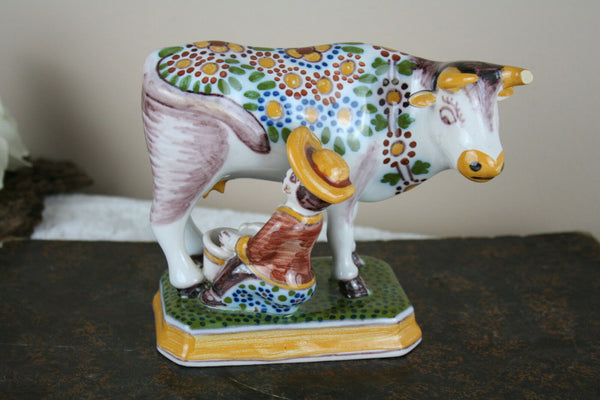 Dutch polychrome Makkum tichelaar marked girl milking cow pottery figurine