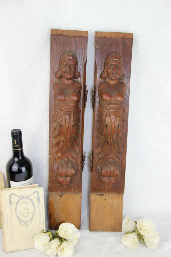 PAIR wood carved figurines from dutch cabinet early 40's