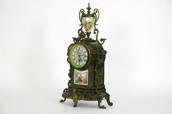 Antique Bronze Clock limoges putti porcelain plaques