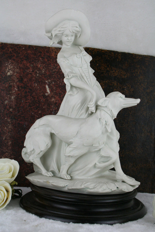 Capodimonte marked Bisque porcelain lady with whippet dog statue marked