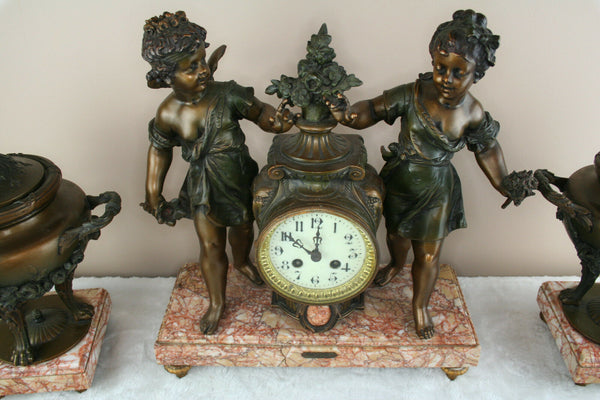 Antique French spelter Bronze clock garniture Vases urns cherubs marked Bruchon