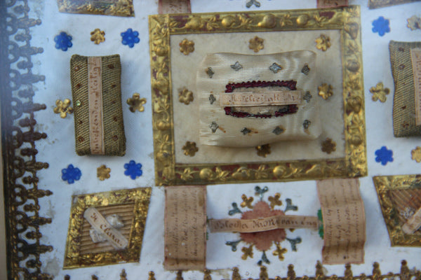 Antique French Relgious Frame with 9  relics saints