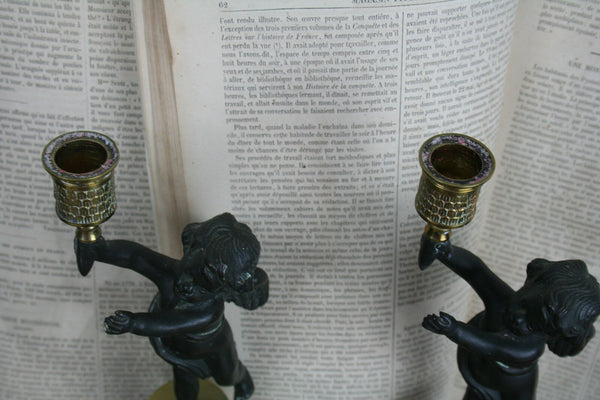 Pair Exclusive 19thc Patinated Bronze and Parcel Gilt Putti-form Candlesticks