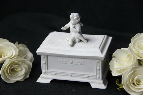 German Bisque porcelain marked Putti lidded box jewelry