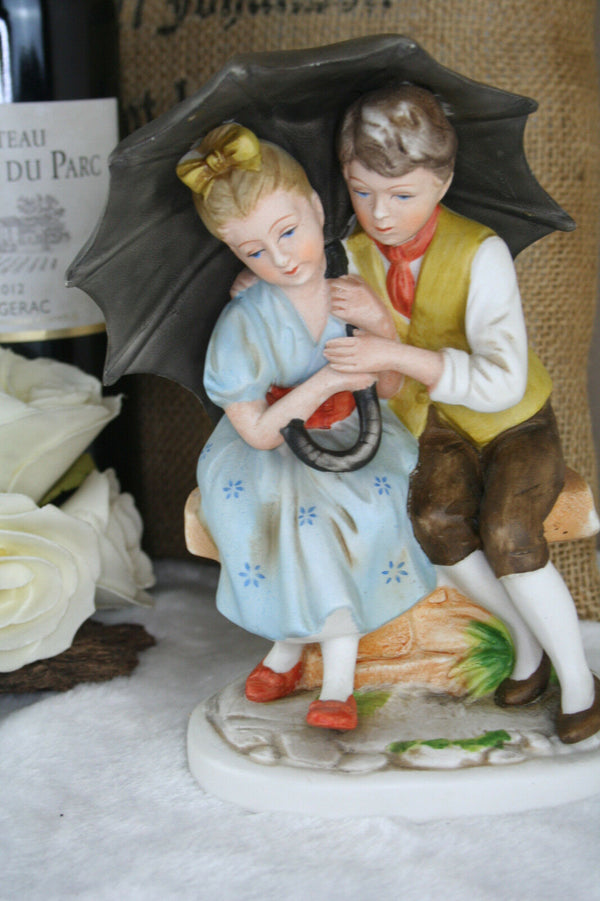 German vintage porcelain bisque romantic couple umbrella figurine 1960's