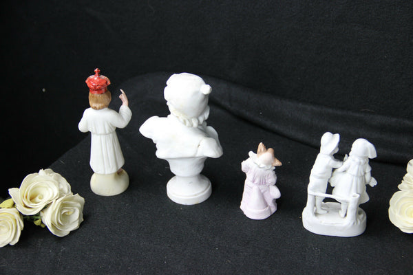 Set of 4 porcelain / bisque statues