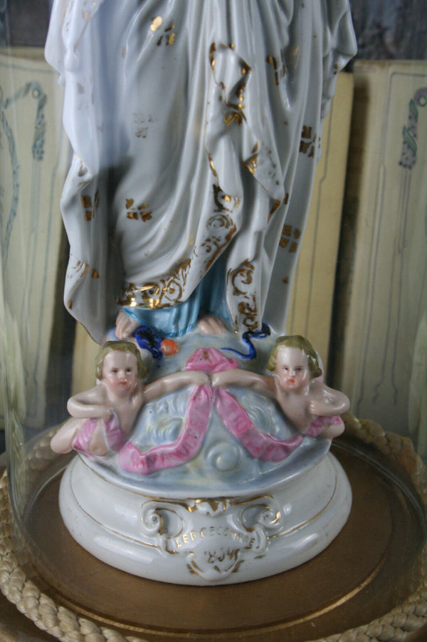 antique porcelain Holy MAry MAdonna statue with cherubs on base  under globe