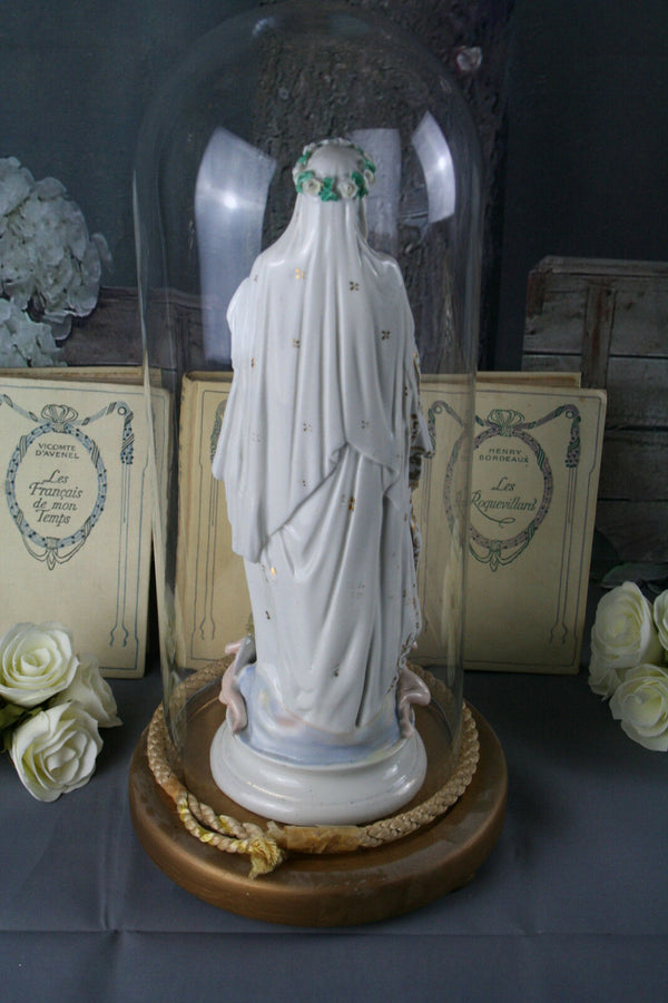 antique porcelain Holy MAry MAdonna statue with cherubs on base  under globe