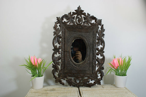 Antique Black forest wood carved apothecary wall cabinet with mirror rare