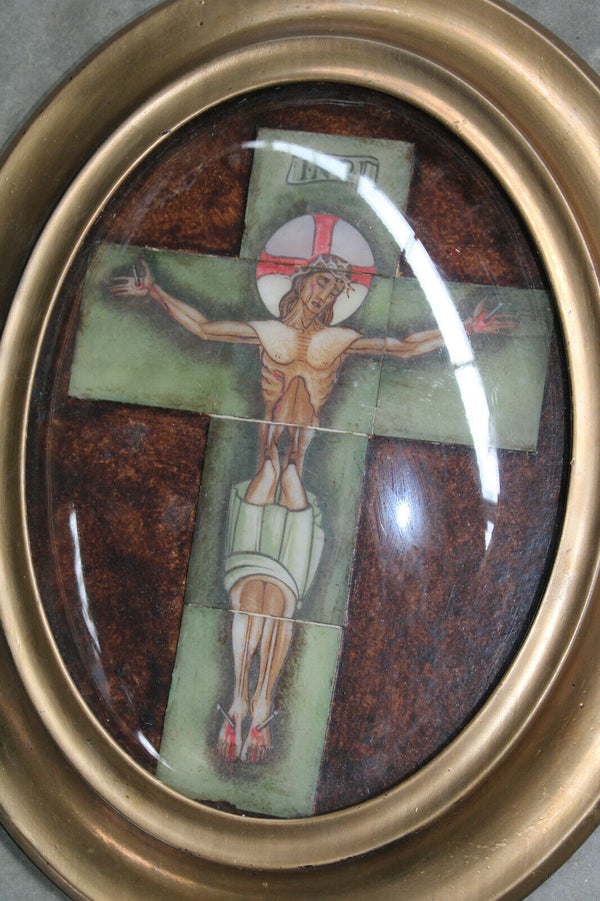 Antique French crucifix in tiles ceramic behind glass framed wall panel plaque