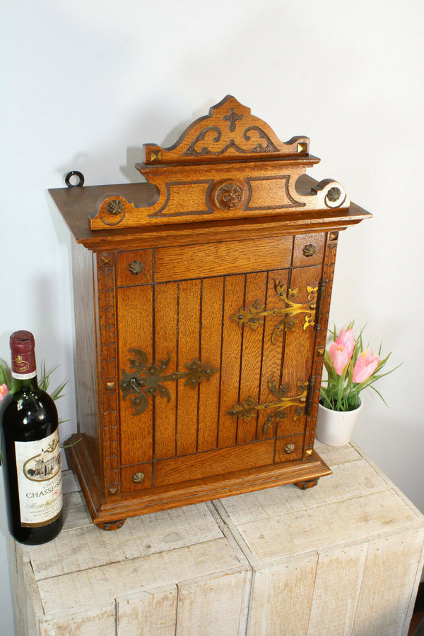 Antique French wood carved neo gothic lion head apothecary cabinet