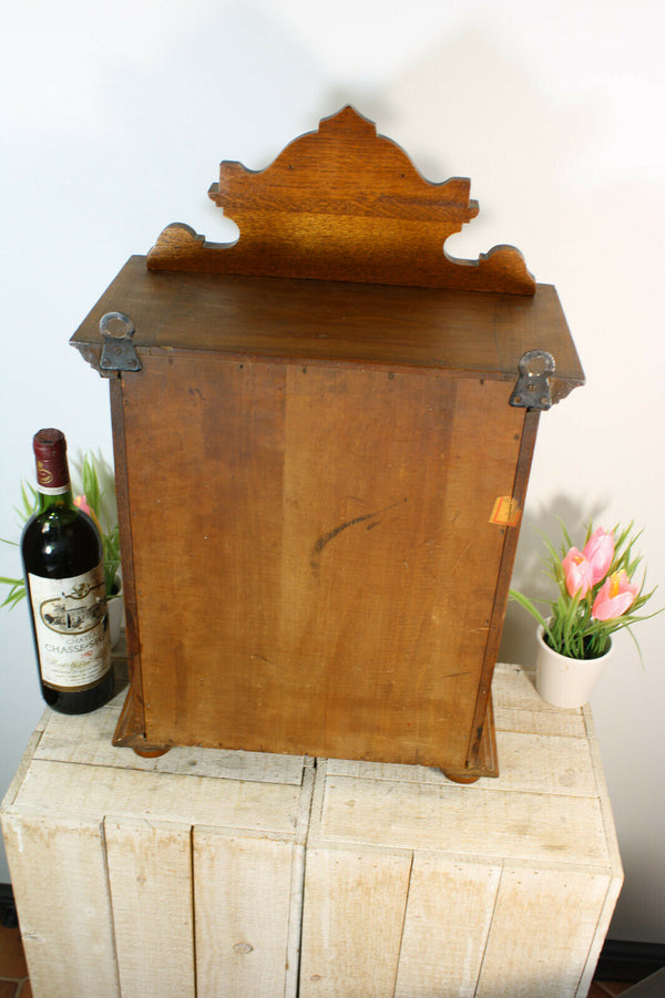 Antique French wood carved neo gothic lion head apothecary cabinet