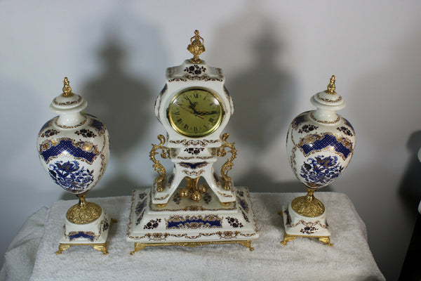 Vintage Limoges porcelain mantel clock set vases marked