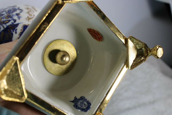 Vintage Limoges porcelain mantel clock set vases marked