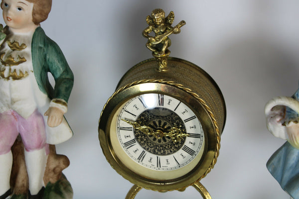 Vintage 1970 Porcelain figurine Brass cherub putti lion paw table clock