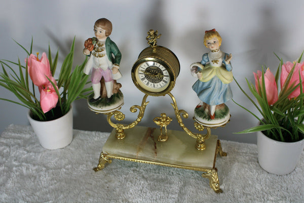 Vintage 1970 Porcelain figurine Brass cherub putti lion paw table clock