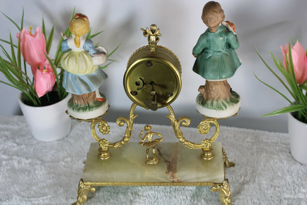 Vintage 1970 Porcelain figurine Brass cherub putti lion paw table clock