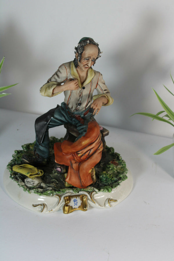 Vintage capodimonte Conte signed porcelain statue leather worker figure